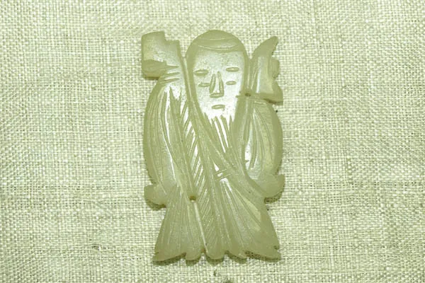 Antique Chinese Carved Jade pendant of Jurojin