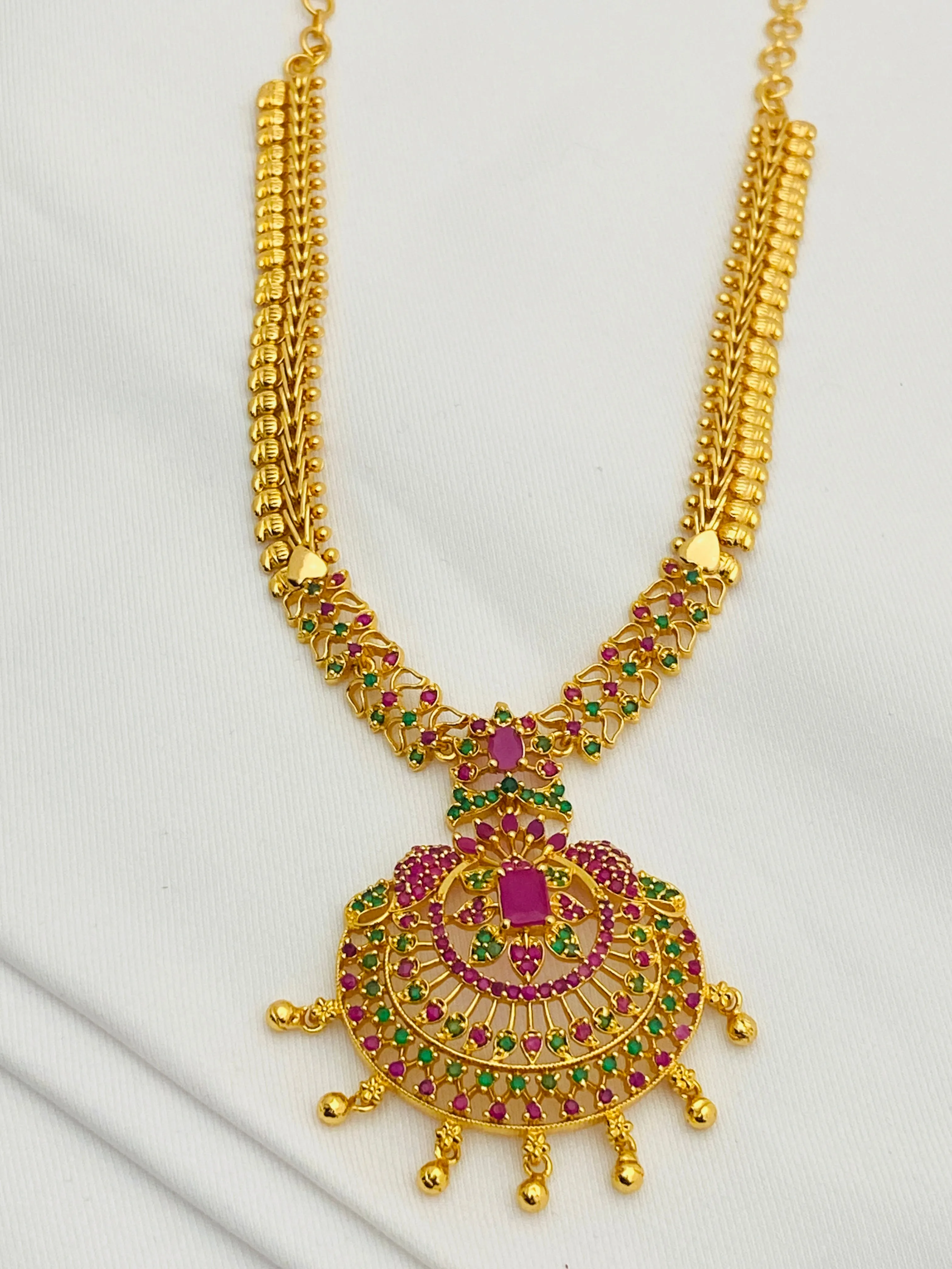 Attractive Party Wear Gold Plated Necklace With Ruby And Emerald Stones And Drops