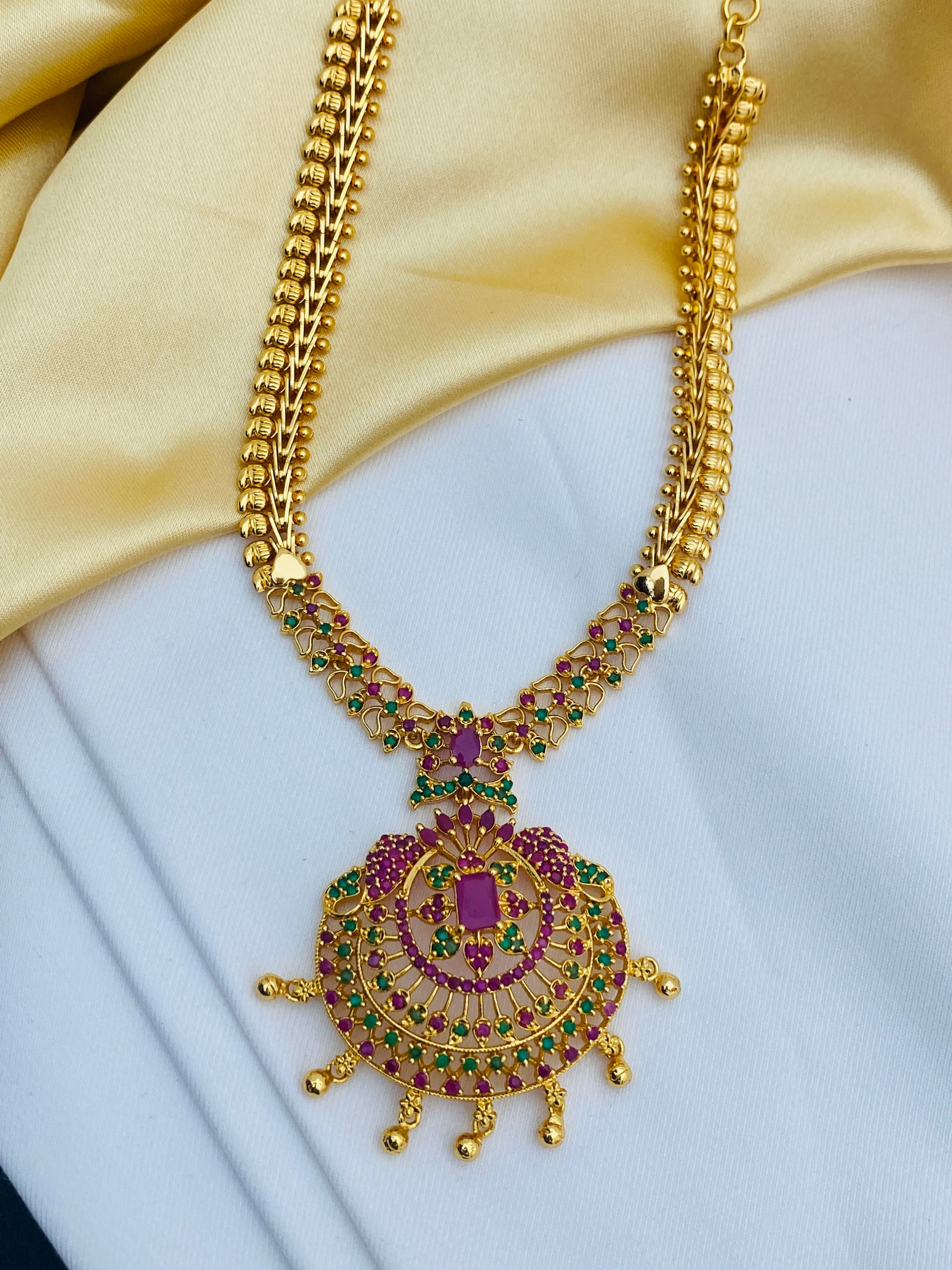 Attractive Party Wear Gold Plated Necklace With Ruby And Emerald Stones And Drops