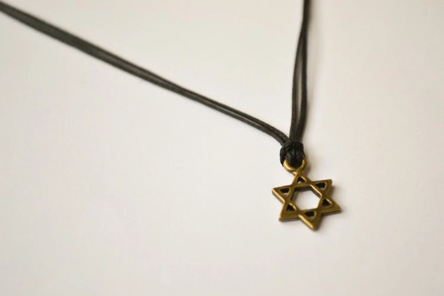 Bronze Star of David necklace for men, black cord