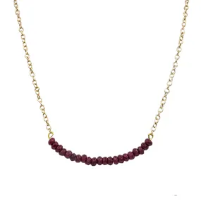 Ruby Small Rondelle Beads on a Bar on a Gold Chain Necklace