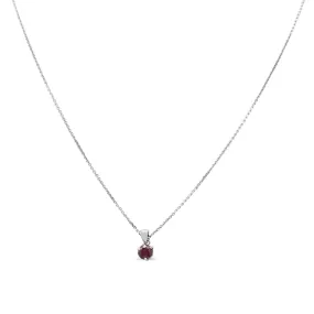 Solitaire Ruby Pendant On An 18" Necklace - 18ct White Gold